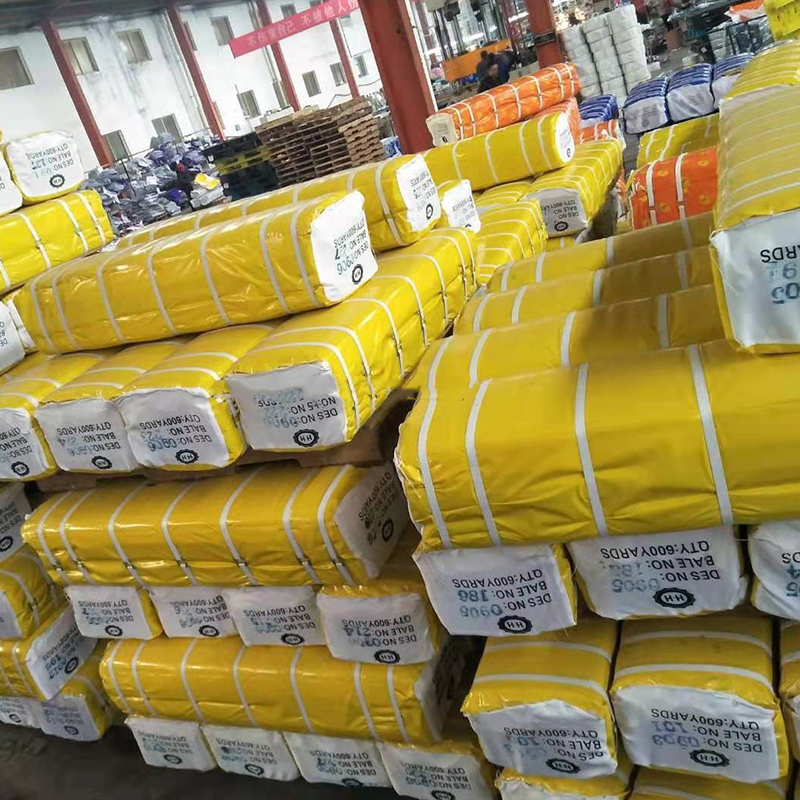 TMIE-06-7 پارچه عرض باریک با چگالی بالا 95 گرم در متر 100 گرم در متر 105 گرم در متر 110 گرم بر متر پارچه موم چاپ پلی استر 115 گرم